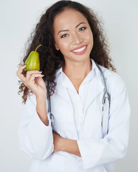 doctor-holding-ripe-pear
